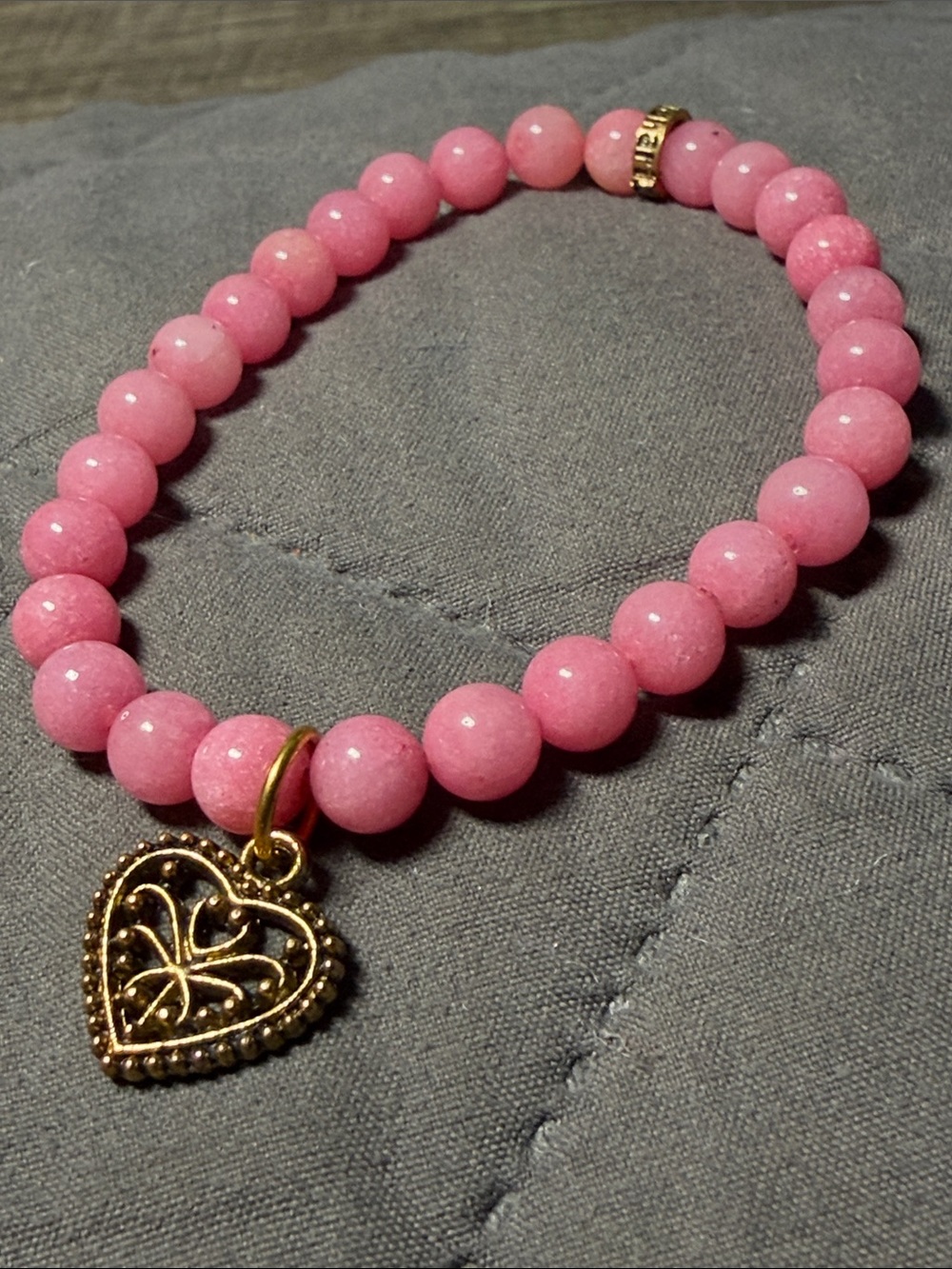 EUC Rose Quartz Stretch Bracelet with Heart Charm.